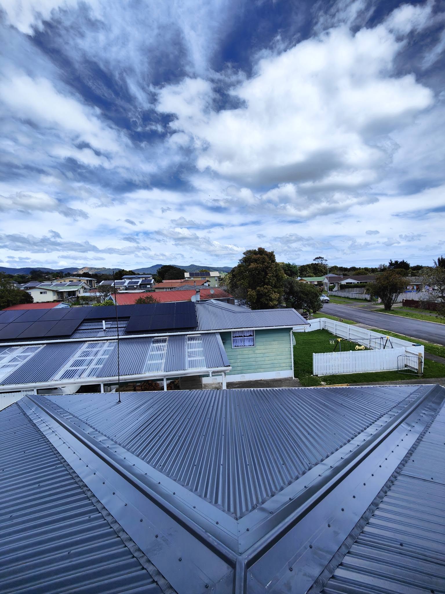 Fresh metal roof with safety helmets on top