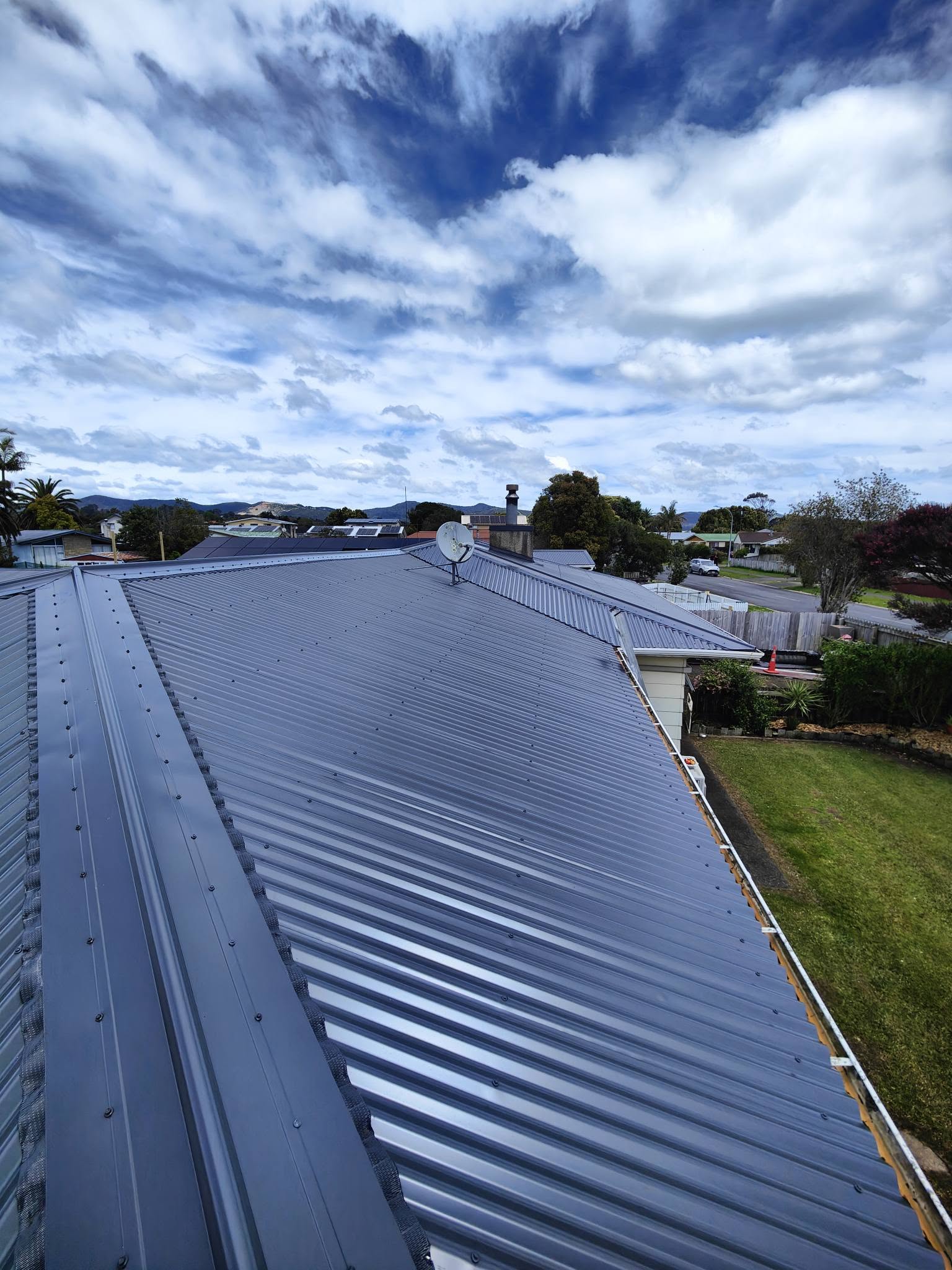 Fresh metal roof with safety helmets on top