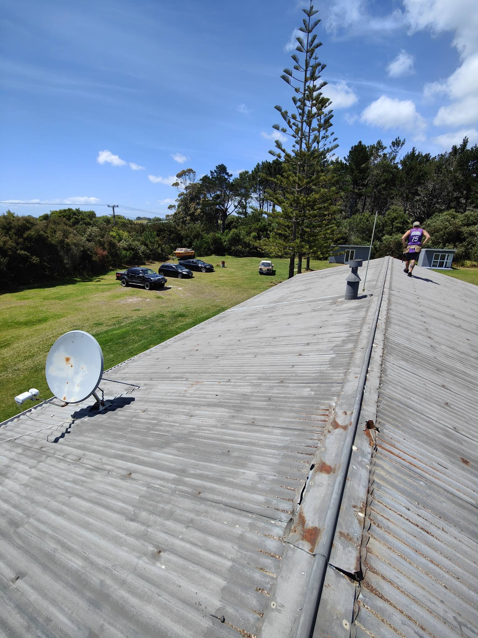 Roof repair work underway from scaffolding